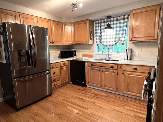 17 Fieldstone Dr, Bangor, ME 04401 - kitchen featuring stainless steel refrigerator with ice dispenser, dishwasher, light wood-type flooring, and light countertops
