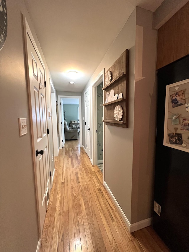 17 Fieldstone Dr, Bangor, ME 04401 - hallway with light wood-style flooring and baseboards