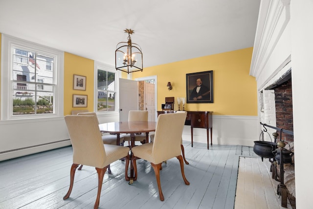 197A Perkins St, Castine, ME 04421 - dining room with hardwood / wood-style flooring and a chandelier