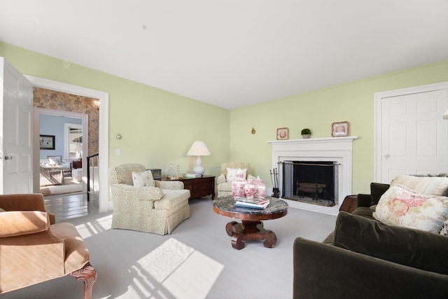 197A Perkins St, Castine, ME 04421 - carpeted living area with a fireplace