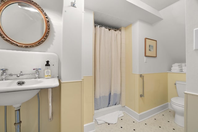 197A Perkins St, Castine, ME 04421 - full bath featuring toilet, a shower stall, and baseboards