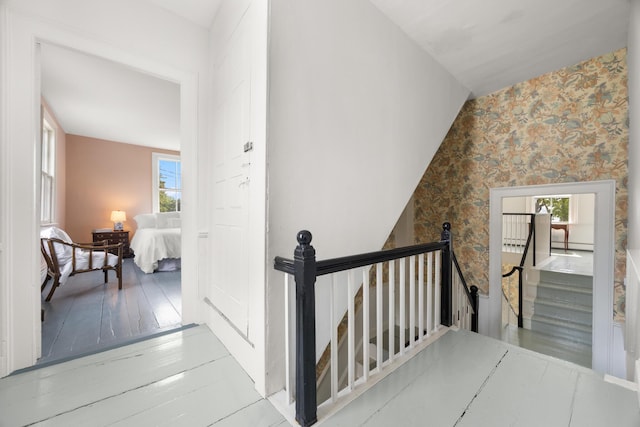 197A Perkins St, Castine, ME 04421 - stairway with wallpapered walls and wood-type flooring