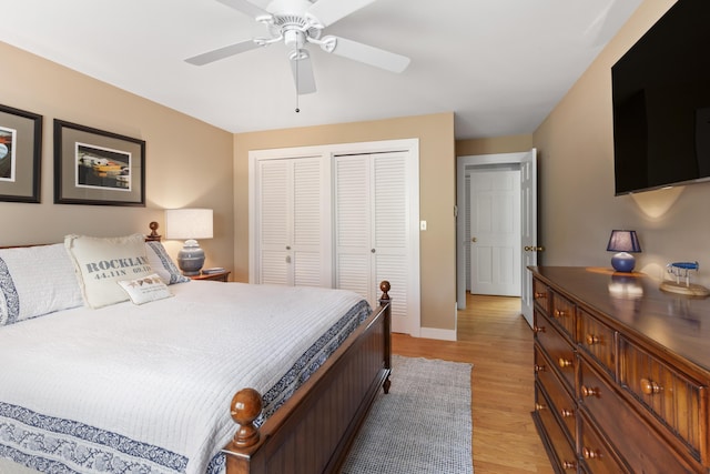 53 Jameson Point Rd Unit 24, Rockland, ME 04841 - bedroom featuring ceiling fan, light wood-style flooring, baseboards, and multiple closets