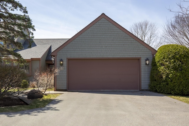 53 Jameson Point Rd Unit 24, Rockland, ME 04841 - garage with aphalt driveway