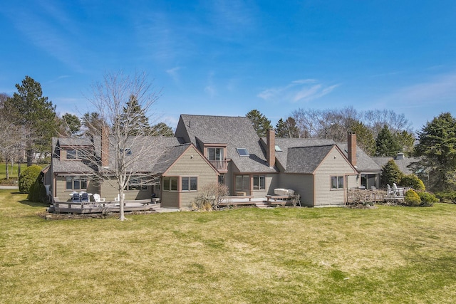 53 Jameson Point Rd Unit 24, Rockland, ME 04841 - rear view of house with a lawn and a wooden deck