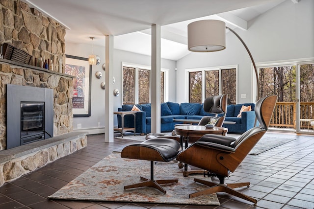 living area with lofted ceiling and a fireplace