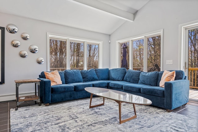living area featuring lofted ceiling with beams and plenty of natural light