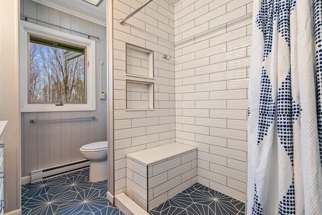 bathroom with tile patterned floors, a baseboard heating unit, toilet, and tiled shower