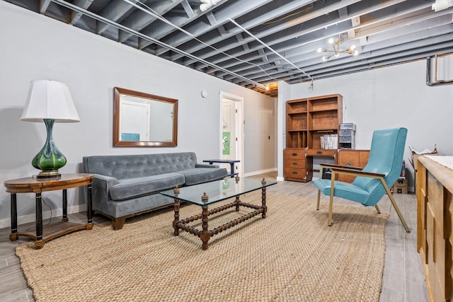 living room featuring baseboards and wood finished floors