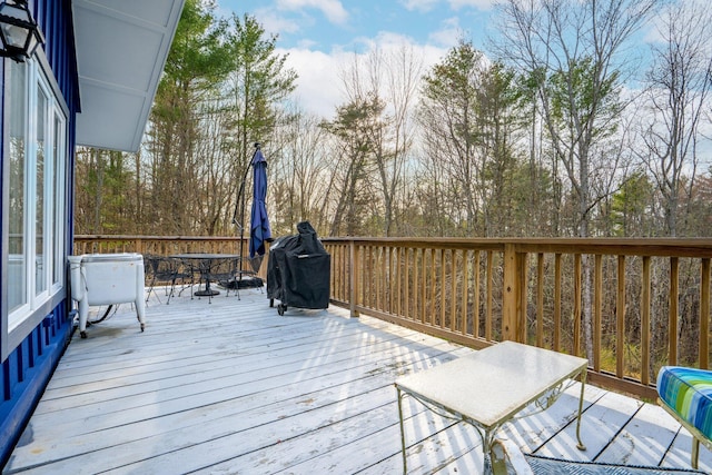 deck featuring outdoor dining space