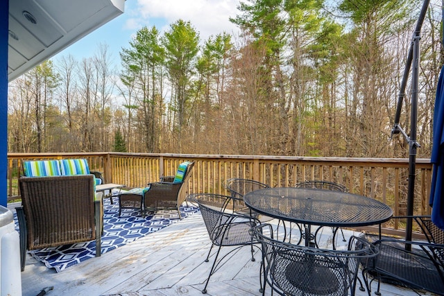 deck featuring outdoor dining space