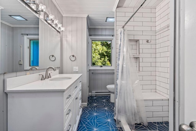314 Meadow Rd, Topsham, ME 04086 - bathroom featuring crown molding, vanity, tiled shower, and baseboard heating