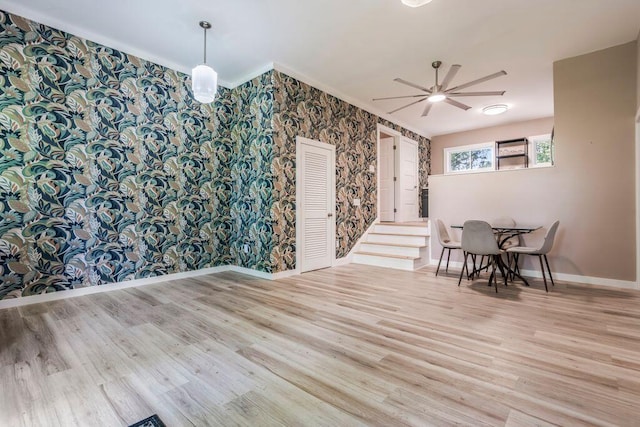 314 Meadow Rd, Topsham, ME 04086 - dining area featuring wallpapered walls, a ceiling fan, wood finished floors, and crown molding