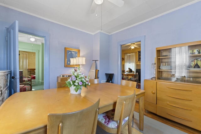 27 Townsend Ave, Boothbay Harbor, ME 04538 - dining room featuring ornamental molding and a ceiling fan