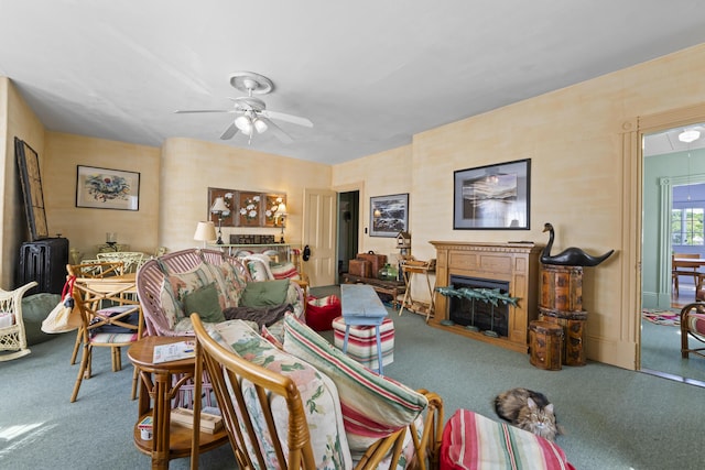 27 Townsend Ave, Boothbay Harbor, ME 04538 - carpeted living area featuring a fireplace and a ceiling fan
