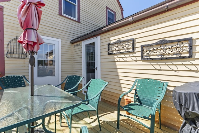 27 Townsend Ave, Boothbay Harbor, ME 04538 - wooden terrace with outdoor dining space
