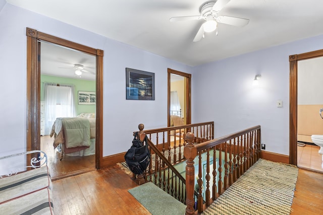 27 Townsend Ave, Boothbay Harbor, ME 04538 - hall with baseboards, an upstairs landing, and hardwood / wood-style floors