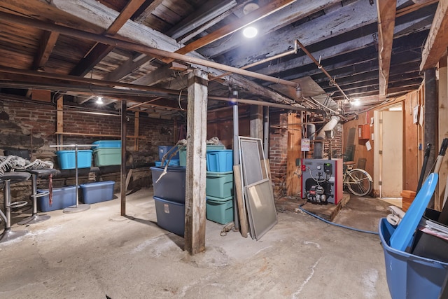 27 Townsend Ave, Boothbay Harbor, ME 04538 - unfinished basement with a heating unit