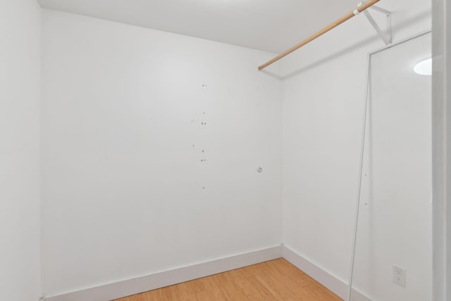 spacious closet with light wood-type flooring