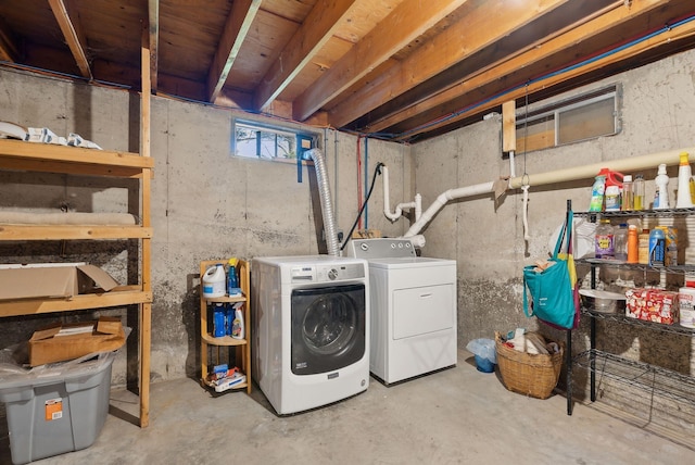 laundry area featuring laundry area and washer and dryer