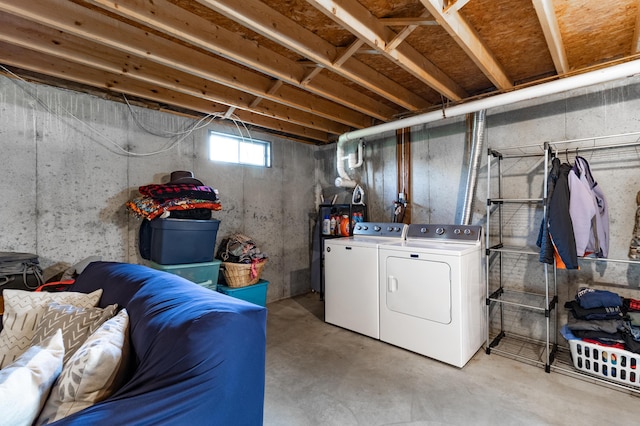 basement with washer and clothes dryer