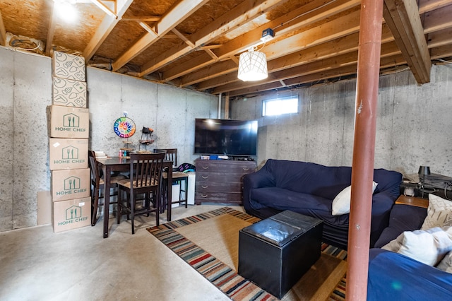 living room with concrete floors