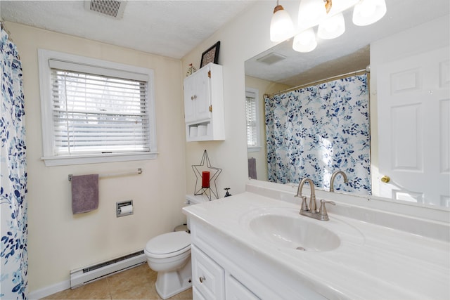 bathroom featuring tile patterned flooring, visible vents, vanity, toilet, and a baseboard heating unit