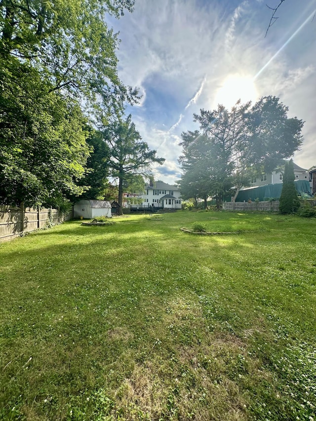 175 Summer St, Auburn, ME 04210 - view of yard featuring a storage unit