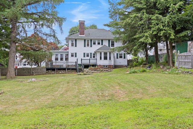 175 Summer St, Auburn, ME 04210 - back of property with a chimney, a deck, and a shingled roof