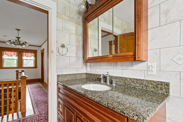 175 Summer St, Auburn, ME 04210 - bathroom featuring a chandelier and vanity