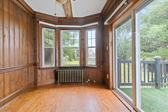 175 Summer St, Auburn, ME 04210 - unfurnished sunroom featuring radiator