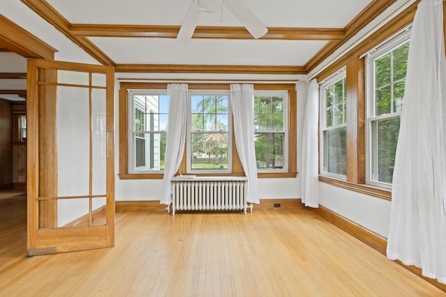 175 Summer St, Auburn, ME 04210 - unfurnished sunroom featuring radiator heating unit, healthy amount of natural light, hardwood / wood-style flooring, coffered ceiling, and beam ceiling