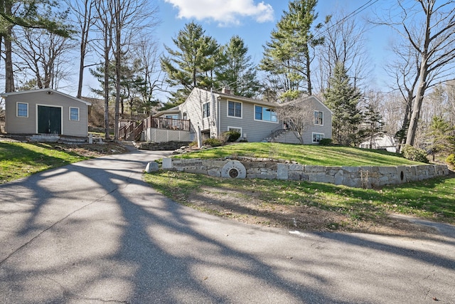 3 The Ledges St, Hallowell, ME 04347 - view of property exterior with a yard, a deck, driveway, and an outdoor structure