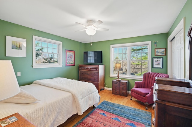 3 The Ledges St, Hallowell, ME 04347 - bedroom with baseboards, ceiling fan, wood finished floors, and multiple windows