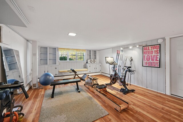 3 The Ledges St, Hallowell, ME 04347 - exercise area with light wood finished floors and wooden walls