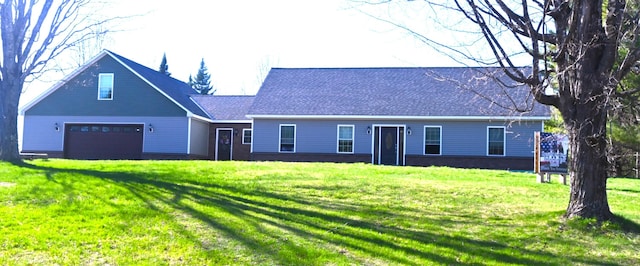 18 Castle Rd, Harmony, ME 04942 - view of front of house featuring a front yard and a garage