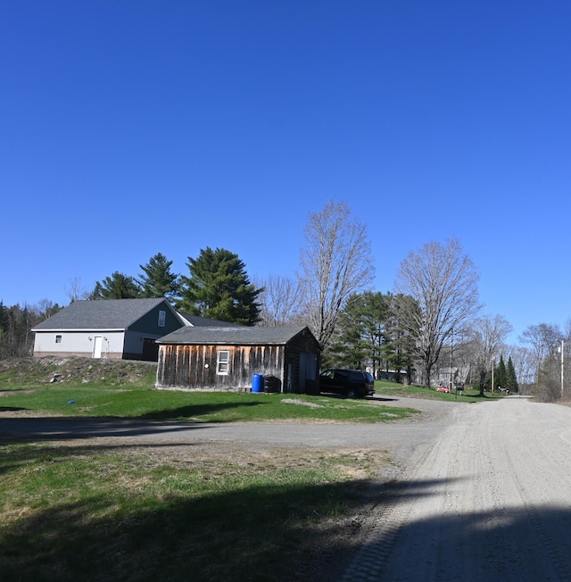 18 Castle Rd, Harmony, ME 04942 - exterior space with dirt driveway and a front lawn
