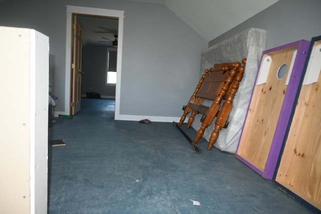 18 Castle Rd, Harmony, ME 04942 - hallway featuring baseboards, concrete flooring, and lofted ceiling