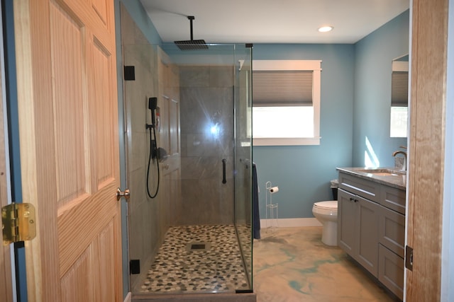 18 Castle Rd, Harmony, ME 04942 - full bath with vanity, baseboards, a shower stall, and toilet