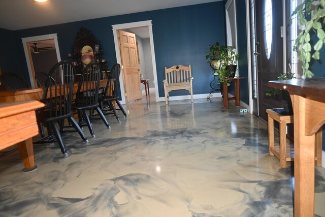 18 Castle Rd, Harmony, ME 04942 - dining area featuring baseboards and concrete floors