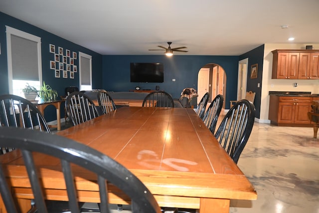 18 Castle Rd, Harmony, ME 04942 - dining area with arched walkways, ceiling fan, and recessed lighting