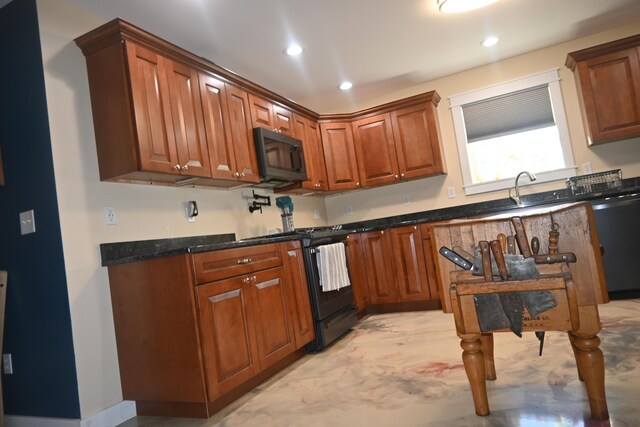 18 Castle Rd, Harmony, ME 04942 - kitchen featuring recessed lighting, brown cabinetry, a sink, and black appliances