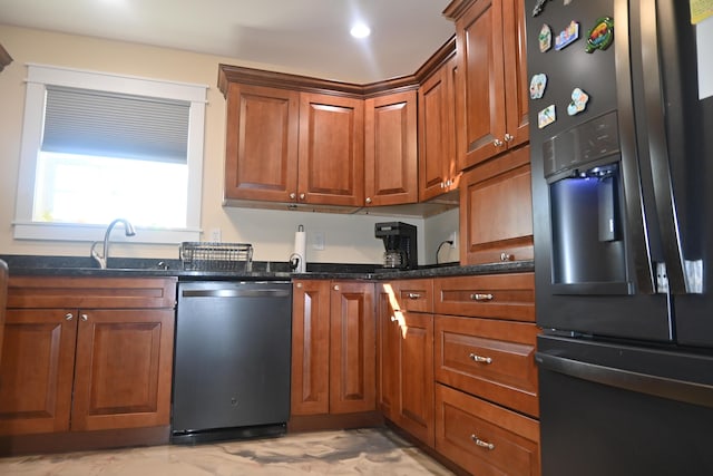 18 Castle Rd, Harmony, ME 04942 - kitchen with dark stone countertops, dishwasher, brown cabinets, and stainless steel fridge with ice dispenser