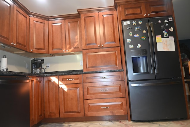 18 Castle Rd, Harmony, ME 04942 - kitchen featuring dark stone counters, brown cabinetry, refrigerator with ice dispenser, and dishwasher