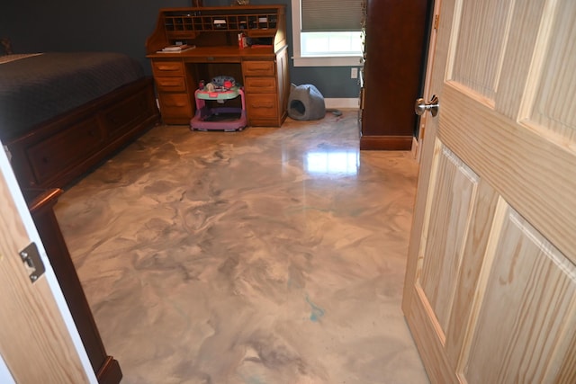 18 Castle Rd, Harmony, ME 04942 - bedroom featuring finished concrete flooring and baseboards