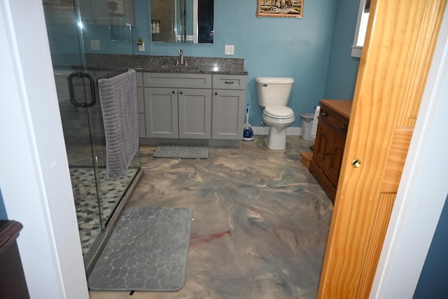 18 Castle Rd, Harmony, ME 04942 - full bathroom featuring vanity, toilet, finished concrete floors, and a stall shower