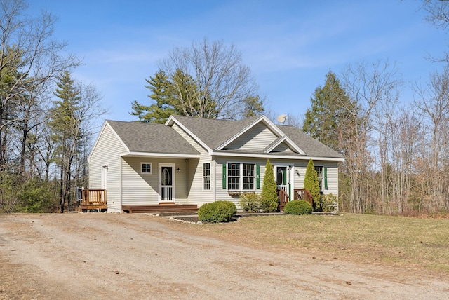 34 Carroll Pit Rd, Newfield, ME 04095 - view of front of house with a shingled roof, driveway, and a deck