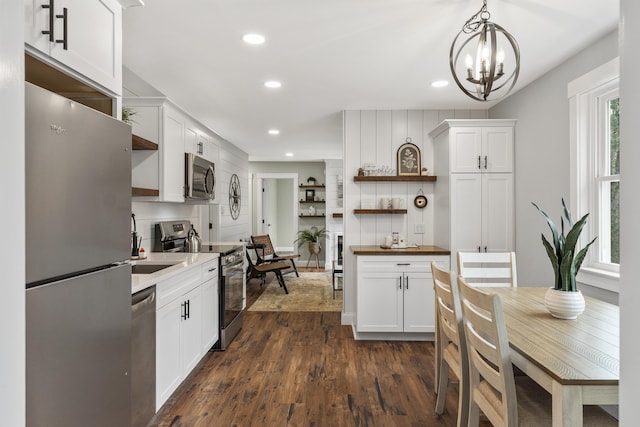 kitchen featuring open shelves, stainless steel appliances, wood counters, recessed lighting, and dark wood finished floors