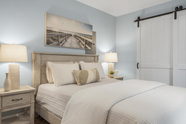 bedroom with a barn door