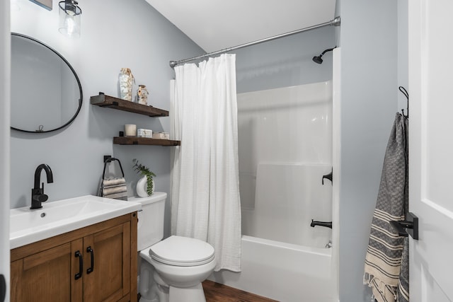 full bathroom featuring toilet, shower / tub combo, vanity, and wood finished floors